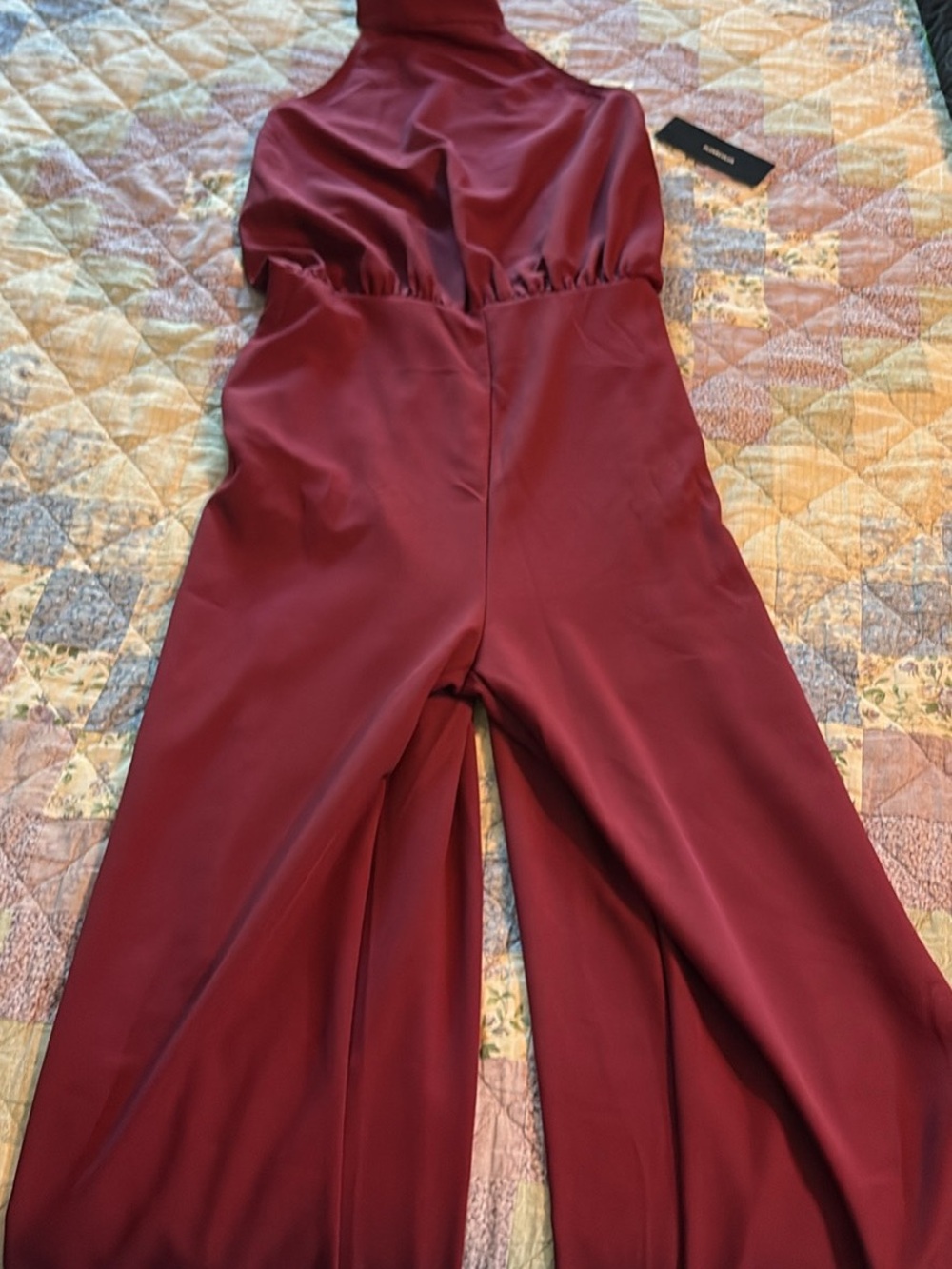 lulus Sleeveless Burgundy Halter Jumpsuit

Other items sold separately